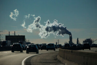CARTERET NEW JERSEY, NJ - NOVEMBER 17: Vehicles move along the The New Jersey Turnpike Way while a Factory emits smoke on 17/11/2017 in Carteret, New Jersey. The United States is still contributing to the global greenhouse gas emissions as the Trump Administration has dismantled the U.S. foreign-policy to reduce carbon pollution. Political divisions in the United States over climate change have spilled over to the outside world as seen at the COP23 United Nations Climate Change Conference that ends today in Bonn, Germany. (Photo by Kena Betancur/VIEWpress/Corbis via Getty Images)