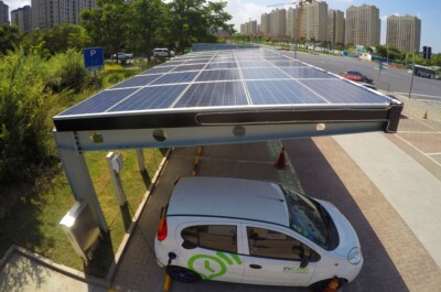 Electric Car Being Charged Photovoltaic Power