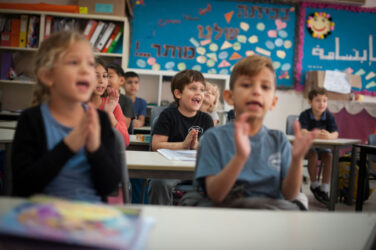 KAFR QARA, ISRAEL--OCTOBER 15: Lessons are taught simultaneously in Hebrew and Arabic to both Jewish and Arab Israeli children at the Wadi Ara Hand in Hand School on 15/10/2016 in Kafr Quara, Haifa District of Israel. The Hand in Hand educational School concept started in 1997 by Amin Khalaf, an Arab teacher and lecturer, and Lee Gordon, a Jewish-American social activist, after they met while working in their respective fields promoting Arab-Jewish dialogue in Israel. The schools they pioneered host an equal number of Jewish and Arab students respectively. Two teachers speak simultaneously in both Arabic and Hebrew while teaching the lesson. Judaism, Islam and also Christianity are taught with equal weight to all students, and each faith's respective religious holidays are also observed. Emphasis is given not only to one's own culture and language but also to those of the 