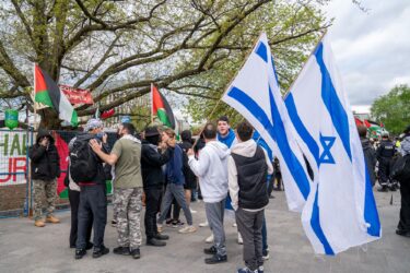 Jewish students have heated exchange with pro-Palestinian protesters outside the student encampment occupying King's College Circle at the University of Toronto