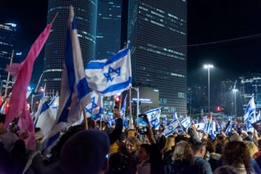 TEL AVIV, ISRAEL - 21/01/2023: Israelis protest in Tel Aviv against plans by prime minister Benjamin Netanyahu new government to trample the legal system and the supreme court