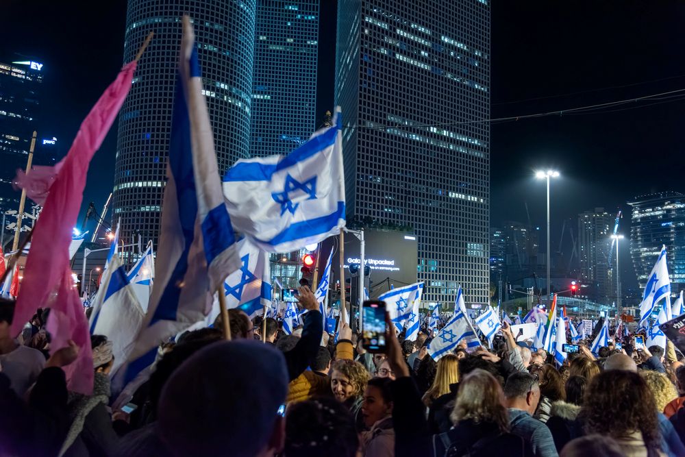 TEL AVIV, ISRAEL - January 21, 2023: Israelis protest in Tel Aviv against plans by prime minister Benjamin Netanyahu new government to trample the legal system and the supreme court